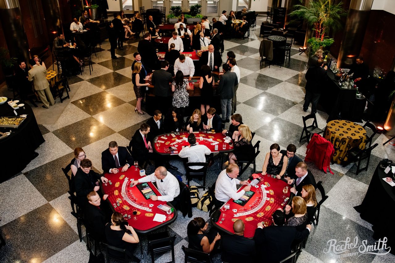 Wide view of guests gathered around Metro Casino event tables