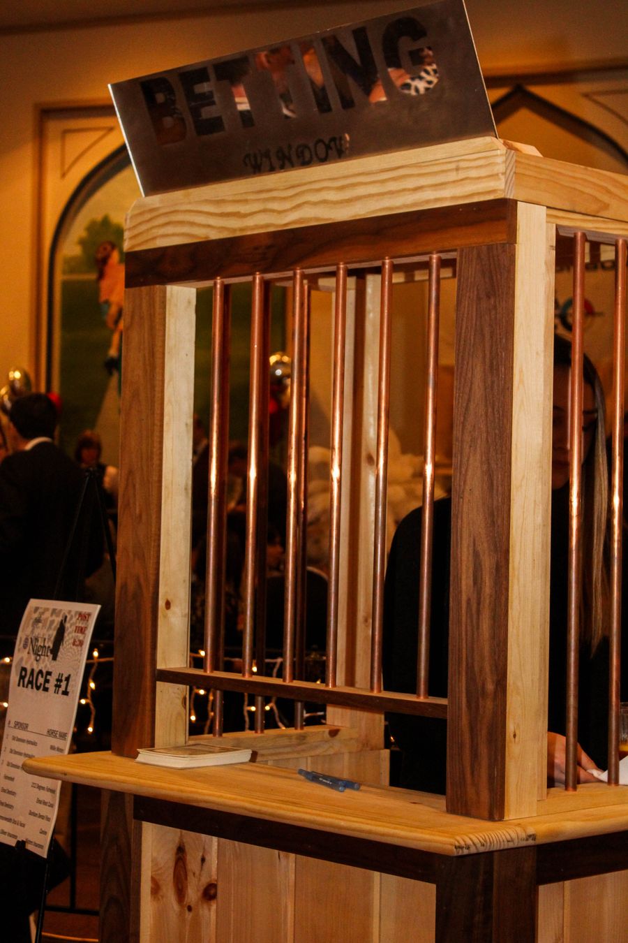 Derby Dash betting window close-up where guests place fun money bets - Metro Casino Events